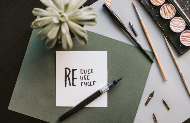 photo of pen beside ink